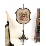 Antique mahogany pole screen with a tapestry of a golden pheasant 153cm high. In good condition