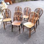 Matched set of six antique wheel back elm and ash country kitchen chairs, one has old worm damage to