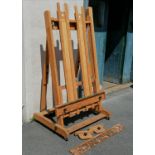 Very large oak artists easel on wheels by Best A Richeson co. USA. 122cm wide x 90cm deep x 210cm