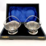 Cased pair of silver swing handled small baskets by Henry Matthews - 12cm x 10cm & 139g ~ in overall