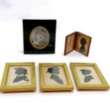 Leather framed silhouette of a lady with gold overpainted highlights with a mounted crest (John