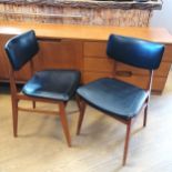 A pair of mid 20th century dining/kitchen chairs with black leatherette seat and back 82cm high x