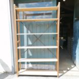 Pine storage shelves with metal straps to the back 210cm high x 125cm wide x 30cm deep