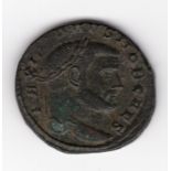 Follis roman coin - obverse Laureate bust facing right (MAXI...NVS NOB CAES) - reverse Moneta
