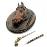 Cold painted bronze horse head inkwell on a wooden base, 26cm long, screws missing from the hinge so