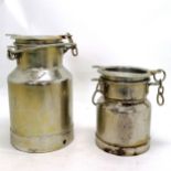 Two small metal churns, the largest 5 litres by S.M. Phelp and the other is 0.5 gallon, some pitting