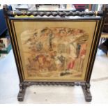 Large scale antique embroidered fire screen with ebonised paint & gilded decoration - 80cm wide