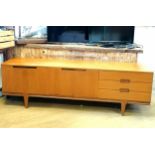 Mid 20th century teak long sideboard 230cm long x 72cm high x 46cm deep. Far left hand cabinet