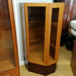 Vintage mahogany glazed corner unit on plinth and wired for lighting in good used condition. 140cm