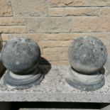 2 large ball finials 30cm diameter x 40cm high. 1 has a chip to the base otherwise in good condition