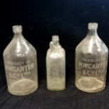 3 large advertising glass bottles - 2 x H W Carter & Co Ltd (Bristol) 35.5cm high & 1 x John
