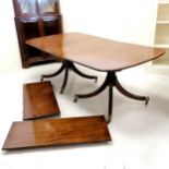 Antique solid mahogany twin pedestal dining table with two spare leaves. 73cm high x 110cm wide x