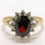 18ct marked gold garnet & diamond cluster ring - size N & 3.8g total weight