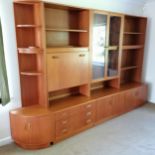 Mid 20th century G-Plan wall unit comprising of corner unit, base and cocktail cabinet above and