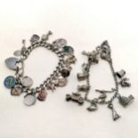 2 x silver charm bracelets (1 with heart padlock catch) inc 2 spinning charms etc - total weight 87g