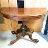 Antique walnut demi-lune pedestal card table with green baize to fold over top. 100cm wide x 45cm