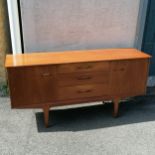 Mid 20th Century c1970's teak sideboard. Some marks to the finish around the handles etc.