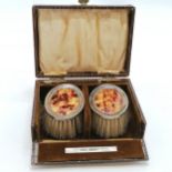 Original cased pair of silver clothes brushes with styled detail - box 14cm x 10cm x 5.5cm