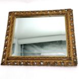 Antique gilt framed mirror with bevel glass - 43cm x 37cm ~ slight loss to detail of frame otherwise