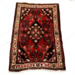 Small red grounded rug - 102cm x 70cm