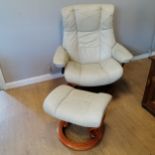 Vintage cream leather 'stressless' swivel chair and footstool in good used condition. width 88cm x