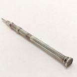 Unmarked silver propelling pencil by G Riddle (marks worn) with crosshatched seal end - 10.5cm