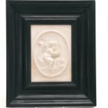 Ebonised framed plaster relief / panel depicting a cherub riding a dolphin - 26cm x 31cm