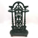 Cast iron green enamel painted stick stand and is designed to lean against the wall - 52cm high x
