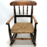 Antique childrens rush seated rocking chair - 48cm high x 34cm across ~ slight wear to seat in 1