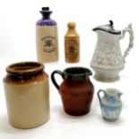 Govancroft footwarmer (with original stopper), Registered mark white relief moulded salt glaze jug /