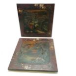 2 x oriental red & black lacquer panels with painted decoration - 30cm square with some losses to