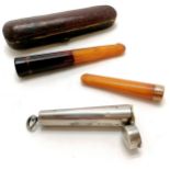 2 x cheroot holder in original cases both with amber mouthpieces (1 in a silver case with a 9ct gold