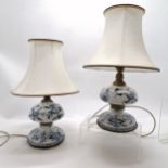Antique pair of blue & white china electric lamps made from 2 parts of an antique oil lamp -