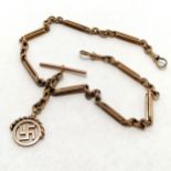 Antique 9ct marked rose gold albert chain (40cm) with a swastika swivel fob by JG&S - 27.6g - SOLD