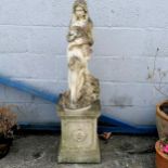 Statue of a girl holding a sheep on square pedestal total height 120cmm, square base 32cm