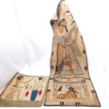 Two Egyptian wall hangings depicting Pharoah etc.. Largest 130cm x 46cm