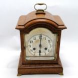 Antique oak cased mantle clock with gong strike & bevel glass door to front & brass fittings &