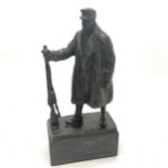 Signed bronze of a soldier holding a rifle on a black marble base titled 'Schwerdtner im feld' -
