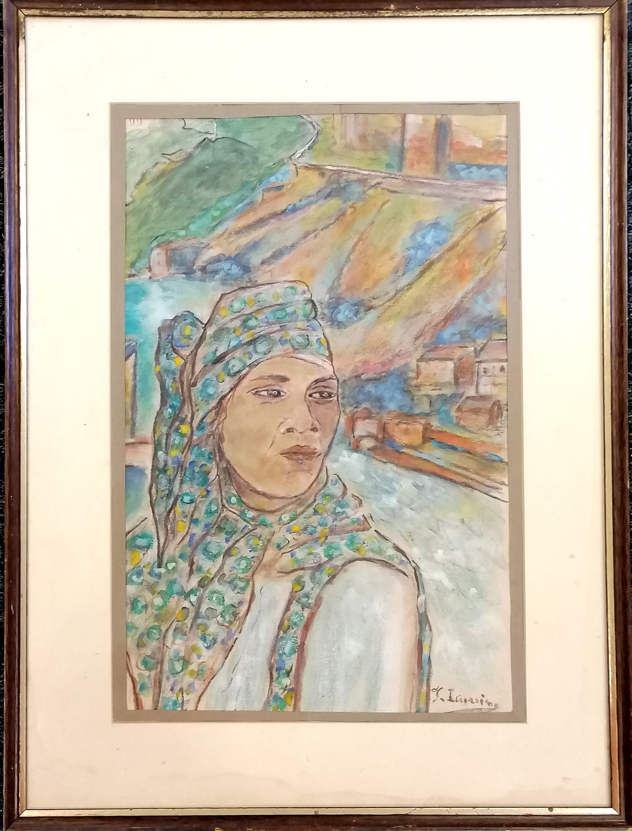 Framed watercolour painting of a young woman in a village environment signed F Iturrino (notes on