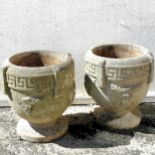 Pair of weathered down concrete planters with lion mask / swag detail to body & greek key to rim -
