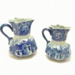 2 reproduction blue and white ironstone jugs, largest 25cm high. In good used condition.