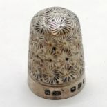 Silver Chester hallmarked thimble by Charles Horner. No. 8. In used condition.