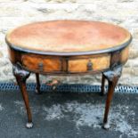 Oval Walnut veneered 2 drawer writing table with leather insert top and has key. 94cm x 64cm x