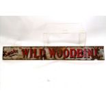 Antique enamel advertising sign Smoke Wild Woodbine 77cm x 10cm. Has obvious losses and corrosion.
