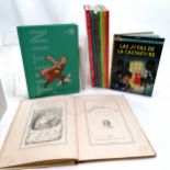 10 x Tintin books (9 in French) + 2 other French books (inc antique La Journee de Mademoiselle