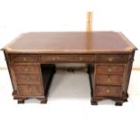 Antique Federal style large walnut pedestal partners desk with drawers to one side and cupboards