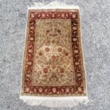 Small red and pale yellow eastern prayer rug. in good used condition. 96cm x 60cm