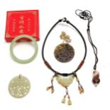 Chinese 2 x hand carved jade pendants (5.3cm diameter), jade bangle etc - SOLD ON BEHALF OF THE