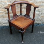 Antique Oak corner chair with pad feet and pegged joints. 83cm high x 62cm deep x 64cm wide in