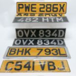 7 x vintage car numberplates inc 3 with black blackground ~ largest 57cm x 15cm